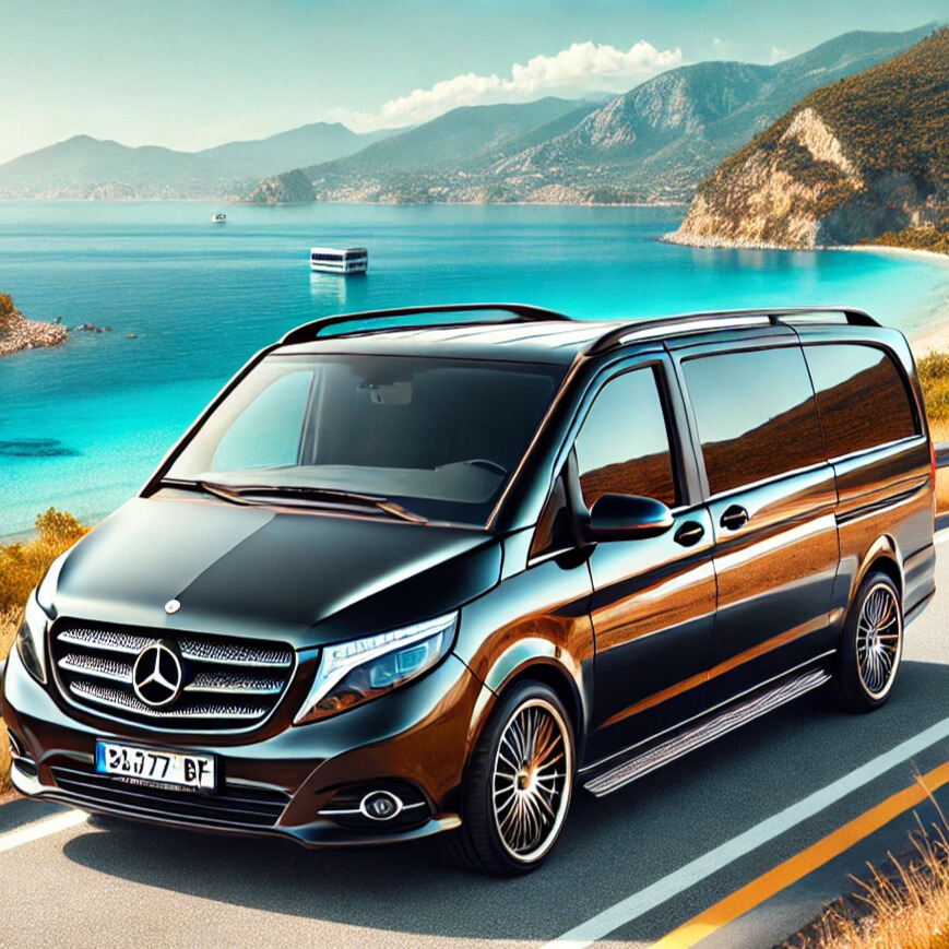 A luxury VIP transfer van (Mercedes Vito) on a scenic coastal road in Antalya, Turkey. The vehicle is sleek and black, with tinted windows and chrome - Düzenlendi gazipasa-transfer-taxa